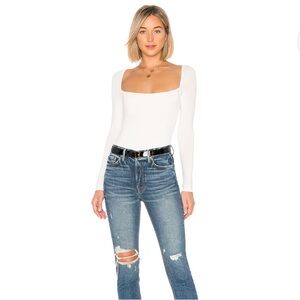 Remy body suit in white. Size XS.